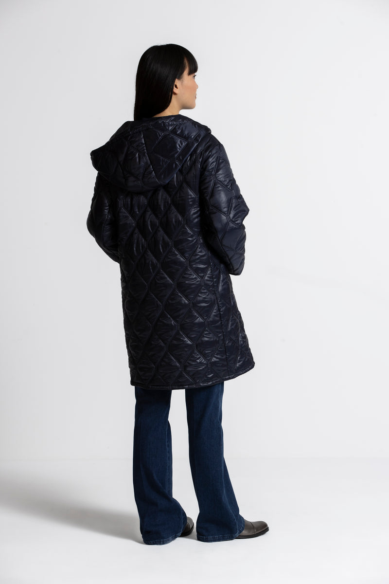 Anna Halflange blauwe jas met doorstikte look